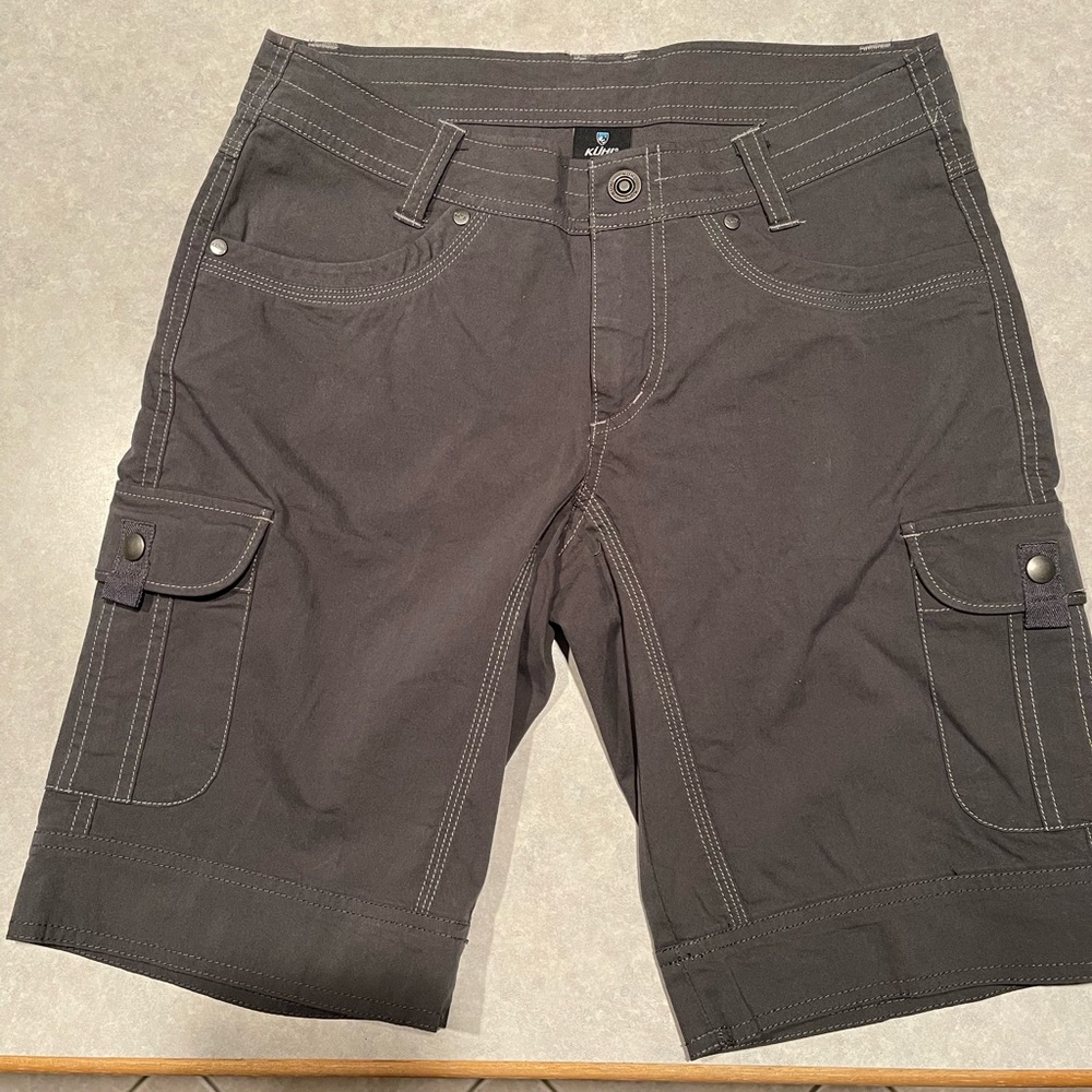 Women’s Kuhl hiking shorts. New without tags. Never worn. Dark gray. Size 4.